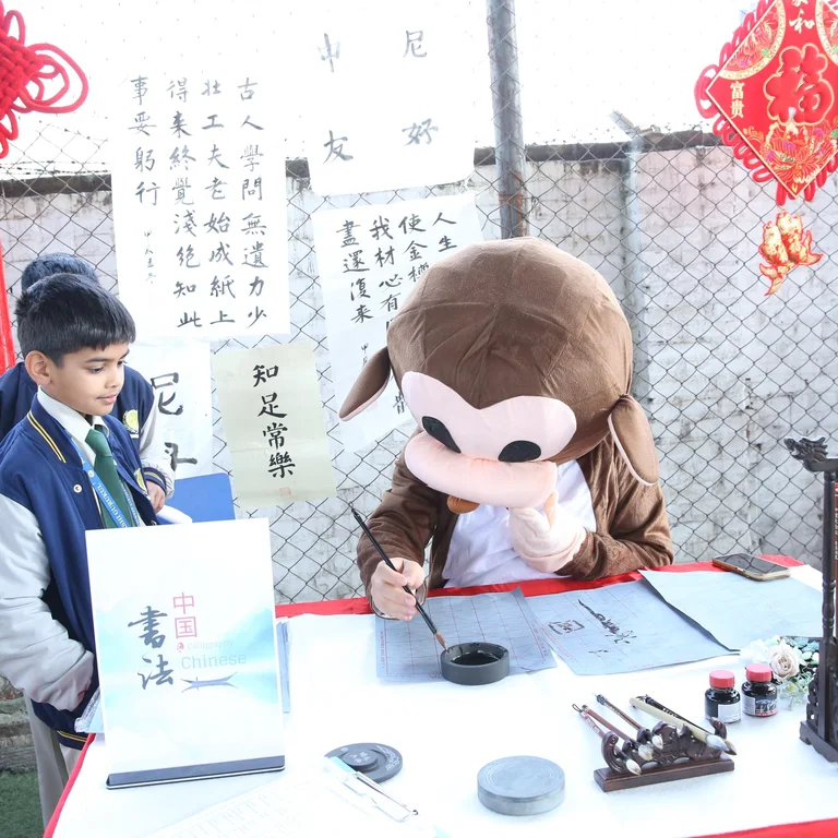 RG student practising Chinese calligraphy